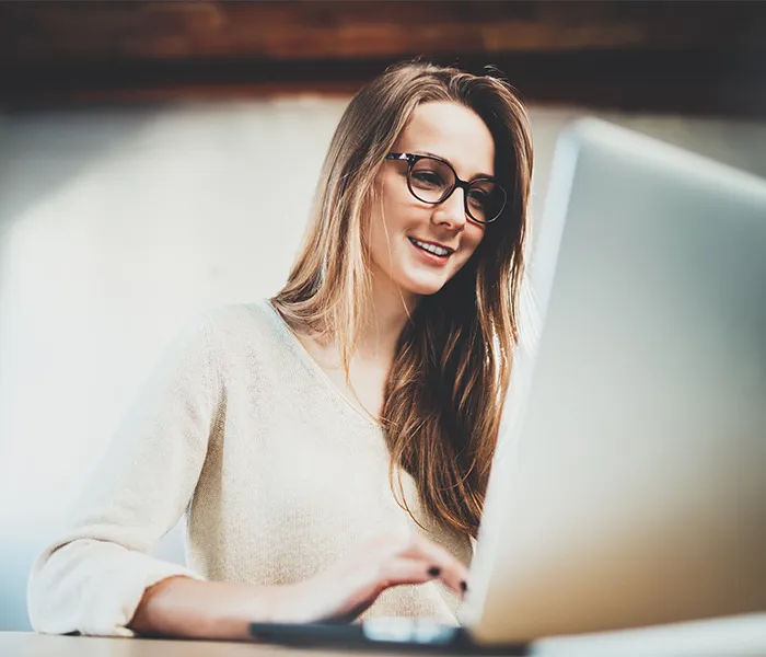 Woman working at laptop